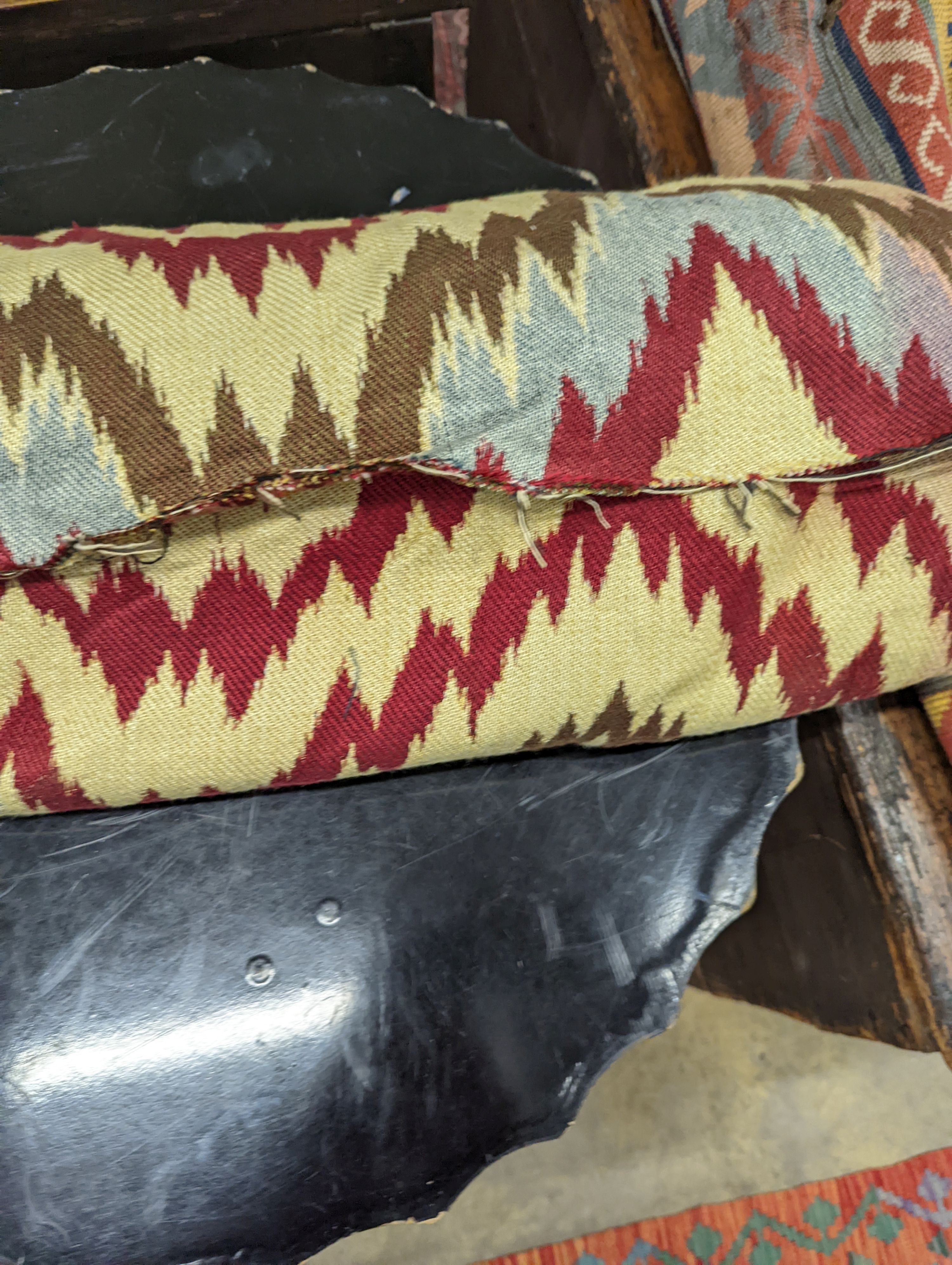 A roll of flatweave fabric with chevron design, width 130cm